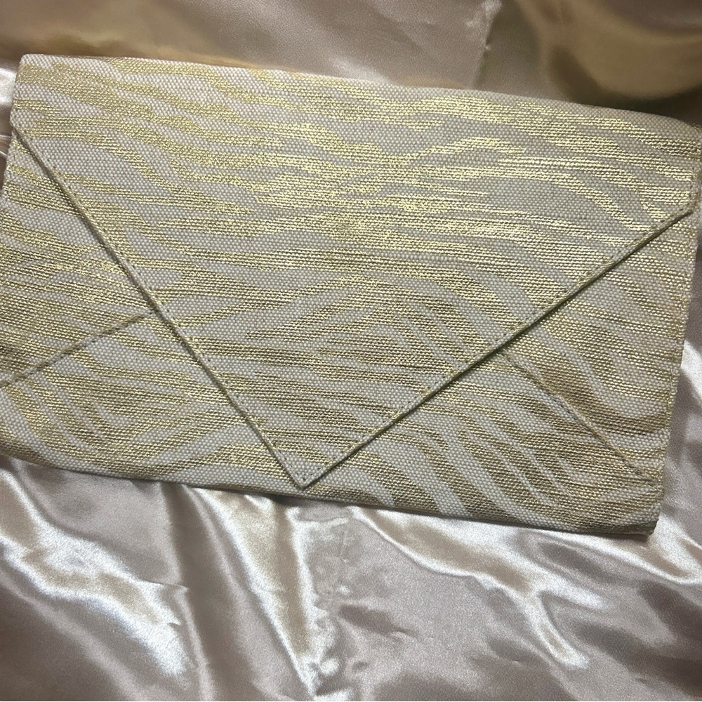 Annick Goutal Gold and Cream Clutch